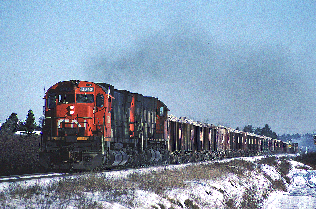 CN 2013 has gypsum loads from the quarry in Milford enroute to Wrights Cove.