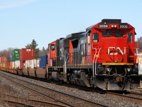 148 descends into Brantford with CN 2035 (ex-UP/CREX 9058) - CN 5687 and 135 cars