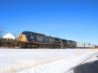 
The CN 324 running track speed to St-Albans VT behing some back yard in St-Jean Qc !