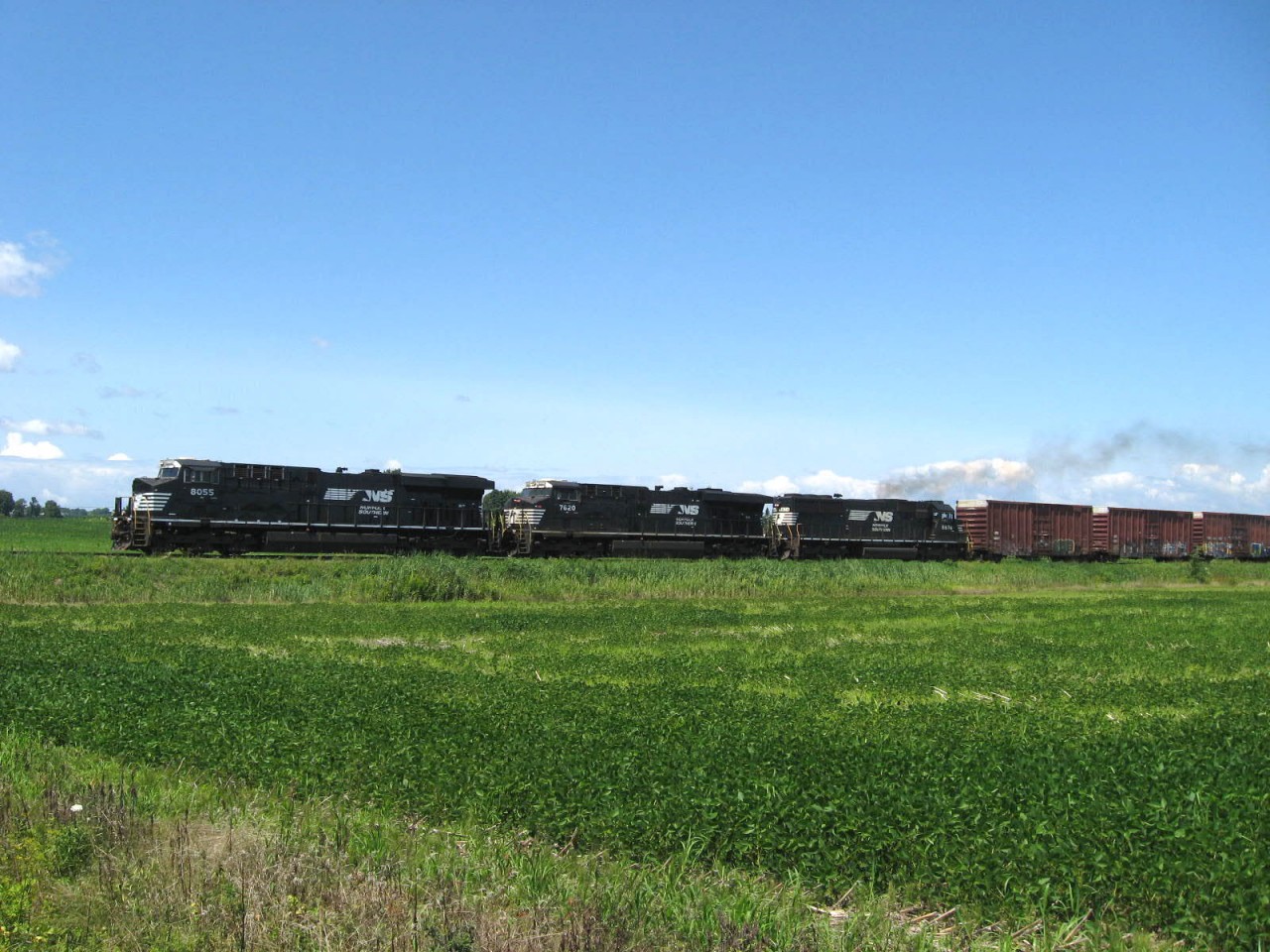 The CN/528-DH930 running slowly before the stop at Rouses Point NY .