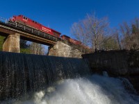 Canadian Pacific train # 246 hustles across the 1910-built trestle at Progreston, Ontario.