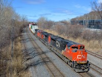 CN 8942, CN 8895 & CN 2644 head east with CN 120 on a beautiful spring morning.