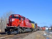 <b>Coming off of the old NJ.</b> CP 253 with a nice lashup of CP 6252 and CSXT 674 is coming off the old Napiervielle Junction Railway (a Delaware & Hudson subsidiary that ran from Rouses Point, NY to Delson) and onto CP's Adirondack sub at Delson, named after the DELaware & HudSON.