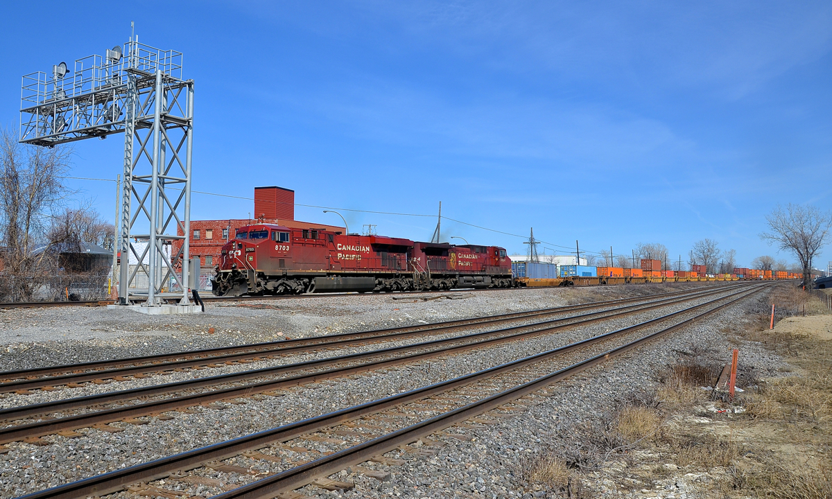 CP 8703 & CP 8524 are leaving Dorval with CP 143 now that the conductor is on board.