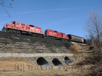 <b><I>Do you want to play a game?</I></b> Guess the location of this image...<br>
Clues: TK12 with GP9u's STLH 8245 - CP 8201 and a short 3 car freight destined for St. Thomas. Two cars are destined for interchange with the STER, while the hopper is just along for the ride, being used as a buffer and will get setoff on the return trip at Putnam.