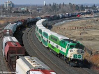 Remembering with great irony how I despised the F59's throughout their service lives, not surprising given the riot of variety they eliminated, I'm pleased to catch a bobtailed GO Train approaching Whitby alongside CN 376. The pleasant two tone GO scheme is juxtaposed with the new, 'Green Vomit' scheme. Thanks to the stuffed shirt who felt that something not being broken is no reason at all not to try and fix it. GO 558 and 563 do the honours. 1216hrs.