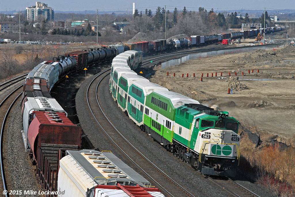 Remembering with great irony how I despised the F59's throughout their service lives, not surprising given the riot of variety they eliminated, I'm pleased to catch a bobtailed GO Train approaching Whitby alongside CN 376. The pleasant two tone GO scheme is juxtaposed with the new, 'Green Vomit' scheme. Thanks to the stuffed shirt who felt that something not being broken is no reason at all not to try and fix it. GO 558 and 563 do the honours. 1216hrs.
