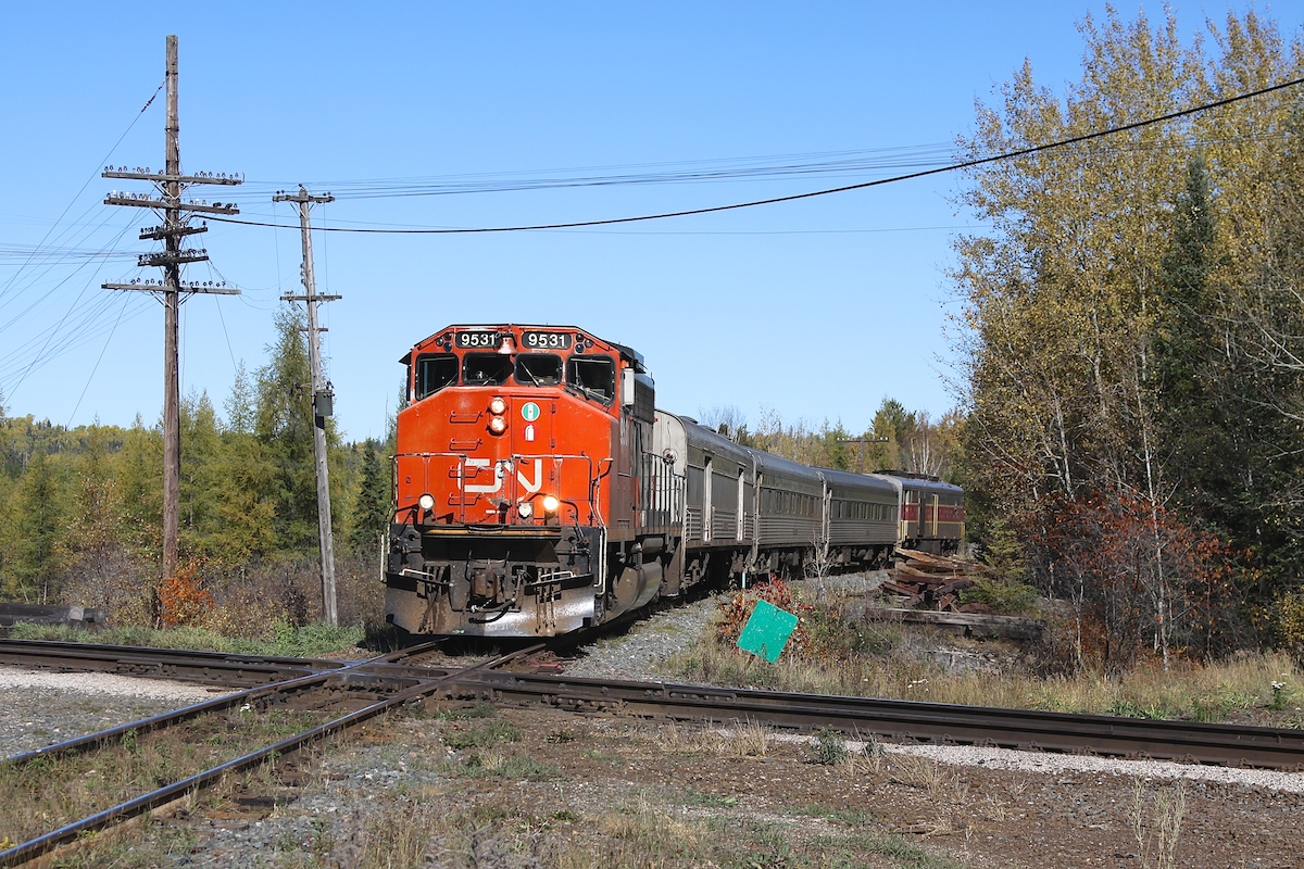 The southbound ACR Tour of the Line train approaches the crossing with CP's White River Subdivision.