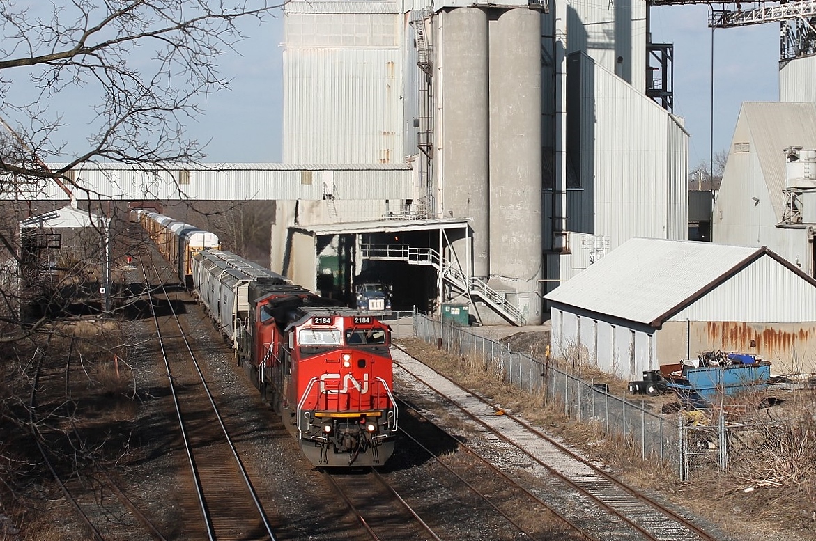 Looking west from Finkle Street footbridge sees an eastbound mixed freight with 2184 and 5652 starting the climb through the station.