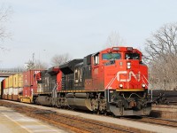 All intermodal 148 powers through the station and up the bank with 8900 and 2172 in charge.