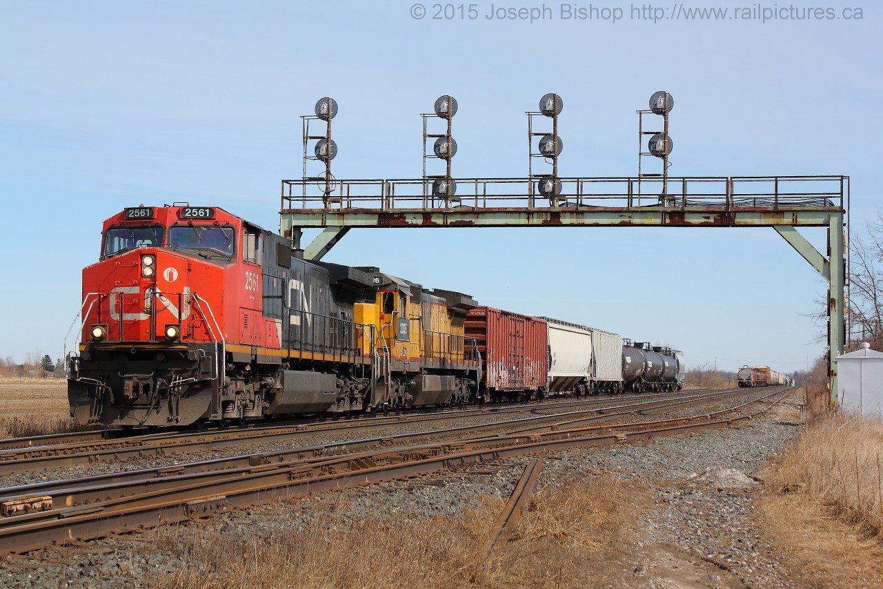 CN 331 pulls out of the North Service track at Paris West with their cars to take to Sarnia.  The power for this days train was CN 2561 and CN 2036.  There aren't many yellow C40-8's floating around the CN system these days so it was nice to see one.