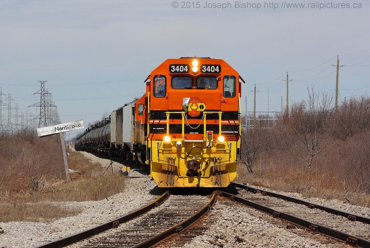 SOR 595 arrives at Nanticoke with RLHH 3404, RLHH 3049 and RLHH 3403 on a nice April afternoon.    It’s been just under one year since I shot at this location, while the angle has not changed the power has.  At this time last year GP20D’s still ruled the Hagersville Sub.  To see my shot from last year click  HERE