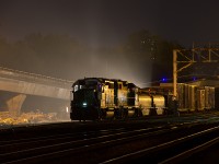 A night shoot out at the busy spot of Braid, finds some BNSF local power being silhouetted by the bright lights of another set of going on duty. 