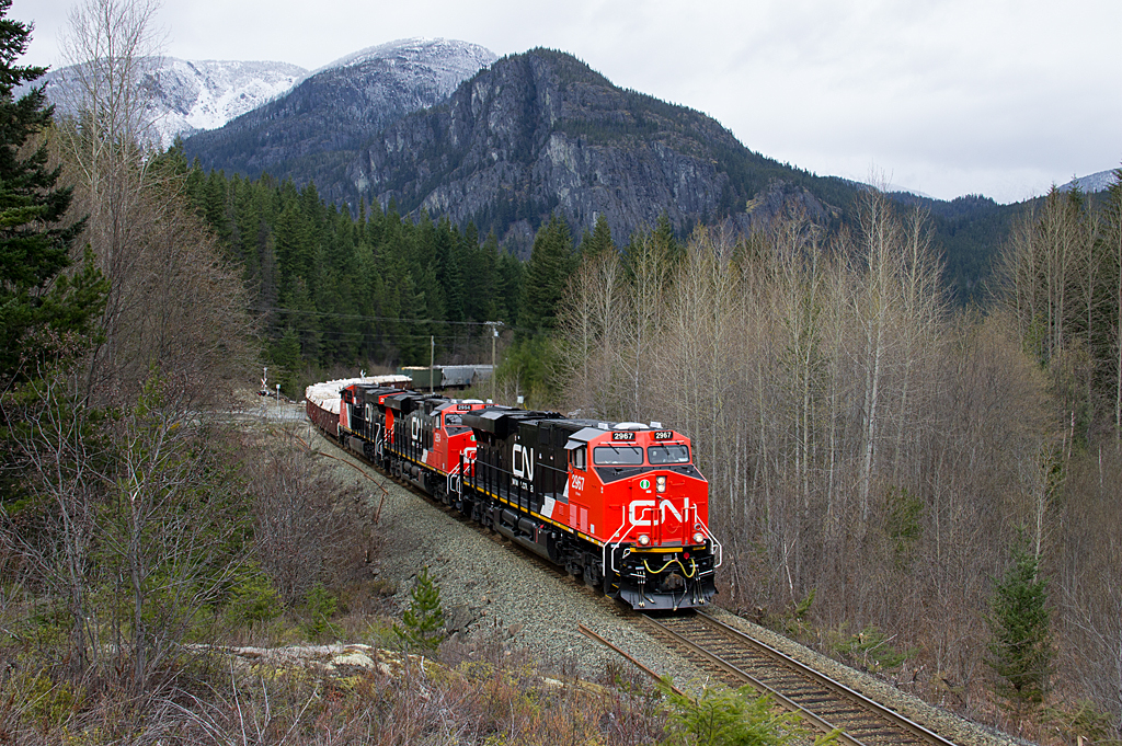 At Green River, almost 10 miles south of Pemberton, the trio continue their pull of 40 cars upgrade. On this day the mountains were getting a nice dusting of snow at higher elevation.