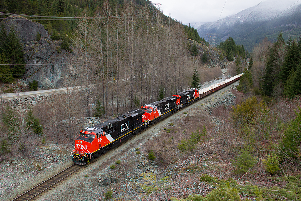 More of a profile shot of CNs newest power, as train 570 passes through Wedge, just north of Whistler, BC, with the Sea to Sky highway off to the left hand side of the image.
