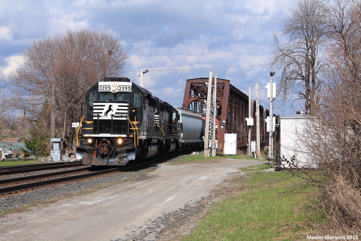 Norfolk Southern train H53 is a transfer that runs from the Buffalo, NY area into the province of Ontario via what is known as the International Bridge located in Fort Erie, ON and Buffalo, NY. The bridge spans the Niagara River, and receives around 5-7 trains on normal days. Here, H53 is pictured with 2 of NS's SD40-2 locomotives idling for a RTC clearance and the engineer taking a short break outside. Minutes later, they fired the bad boys up and took off northbound towards Welland.