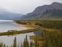 During an evening at Swan Landing, overlooking Brule Lake, we would experience thick clouds, along with a number of rain systems covering the mountains, on the east side of Jasper National Park. Fortunately our timing would work out, as the rain clouds would clear up and brighten just in time for Canadas Premier passenger train "The Canadian" to blast on eastward. The calm waters provided a nice reflection too.  