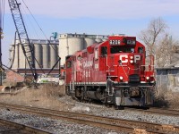 In the midst of piles being driven into the ground, CP 8208 leads a train of autoracks around the curve at mile 0 of the Mactier Sub. At this point in time, work was well underway on the grade separation project at the West Toronto diamond.  