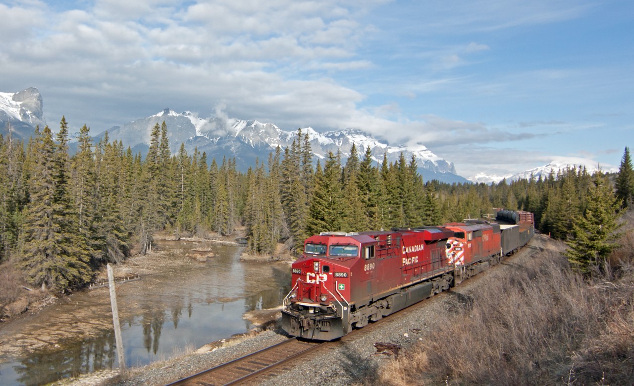 Nice to see a Redbarn out in the mountains, too bad it was not leading. CP 8890 is slowing to take the siding at Gap. It will sit there for over 4 hours as it waits for two more east bound trains and four more west bound before proceeding to Exshaw for some switching duties, only to take the siding again at Ozada for another meet. Slow day for this crew.