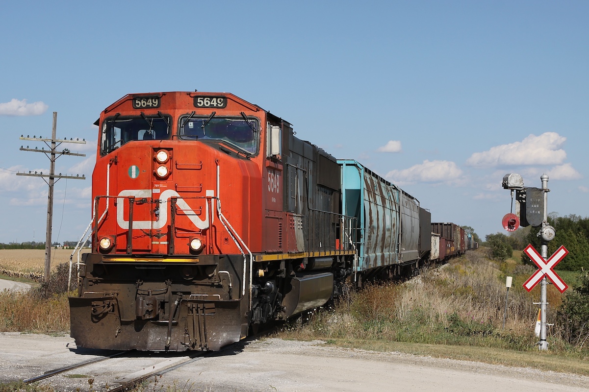 Back in 2010 I was fortunate to be able to shoot the CASO a few times before the area around Tilbury was abandoned some time later.  Here, CN 439 is crossing Morris Line, one of two locations (at the time) that still had operational wigwag signals protecting the crossing.