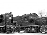 A busy day for the New York Central at Hagersville ON: EMD GP9 6033, ALCO RS36 8024, and Canadian-built and assigned GMD GP7 5822 are lined up on a snowy Winter's day on the CASO.