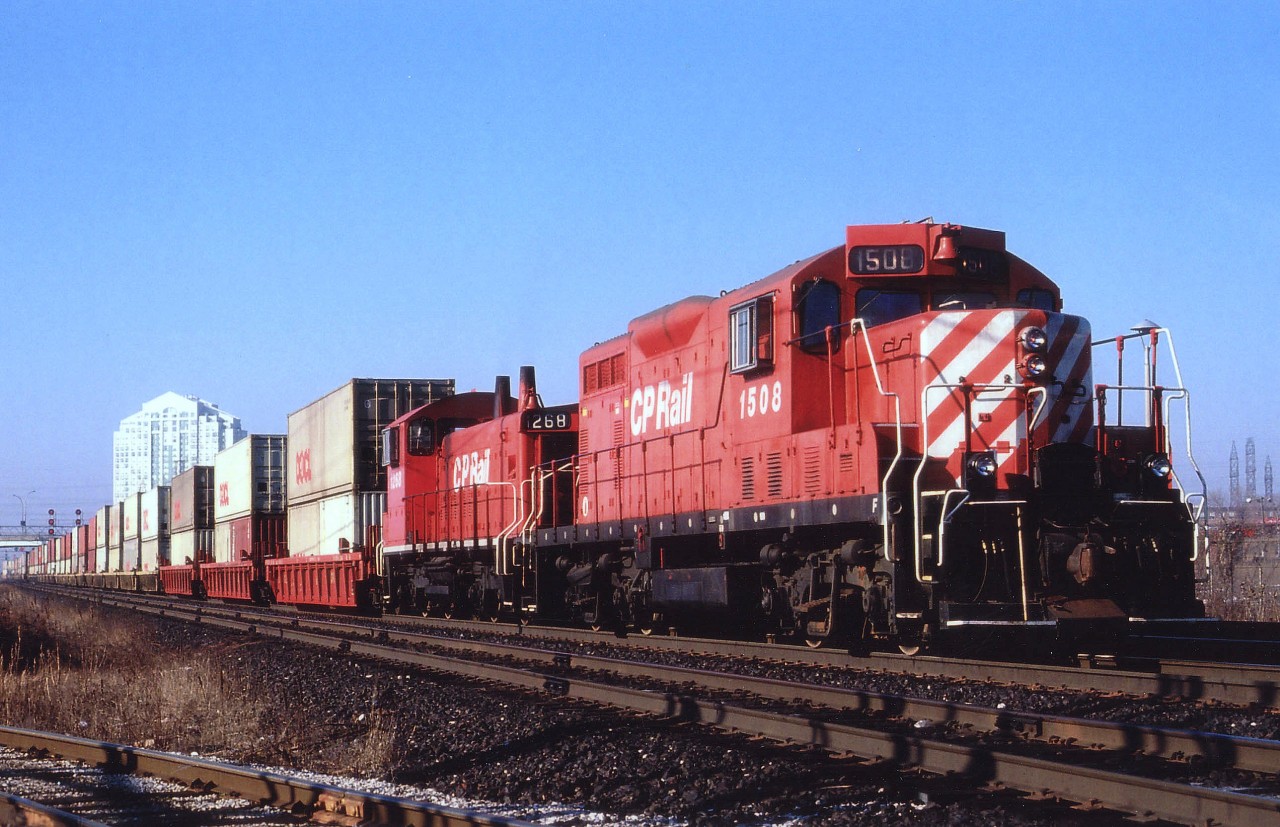 CP 1508 and 1268 lead the Obico Yard transfer on a nice sunny morning back in 1995. The GP was retired on Aug 29,2012 and the SW went to Rail Trust Equipment in 2003. However, my memory has failed me as to exact location of this image and the fact the Obico Yd transfer went to where?? Agincourt?? Daily?? I'm sure someone will kindly straighten me out on this. Thanks.