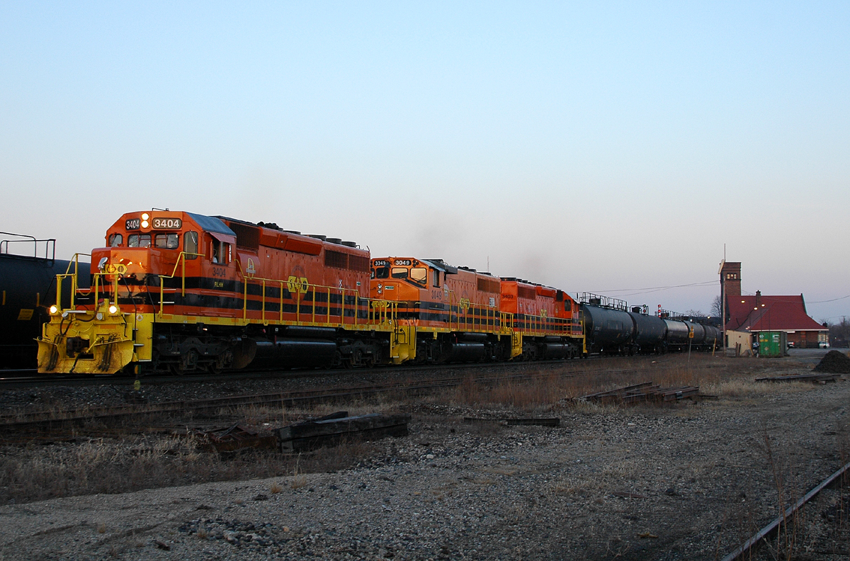 597 makes a rare daytime appearance at Brantford with RLHH 3404 - RLHH 3049 - RLHH 3403 and 30 cars for Paris Jct
