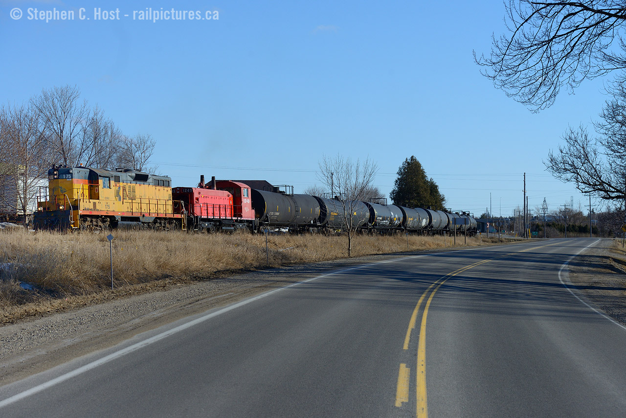 In the 'interesting lashup in 2015' department - here's an OSR train I happened upon while driving west on the 401 on the 17th. A detour for a quick photo, and back on the 401 I go.
In this scene, OSR's St. Thomas job is returning to Ingersoll with 24 cars from the CN interchange at St. Thomas. Previously, this traffic ran over the STER to Tillsonburg, which now makes for much longer St. Thomas trains for the OSR.