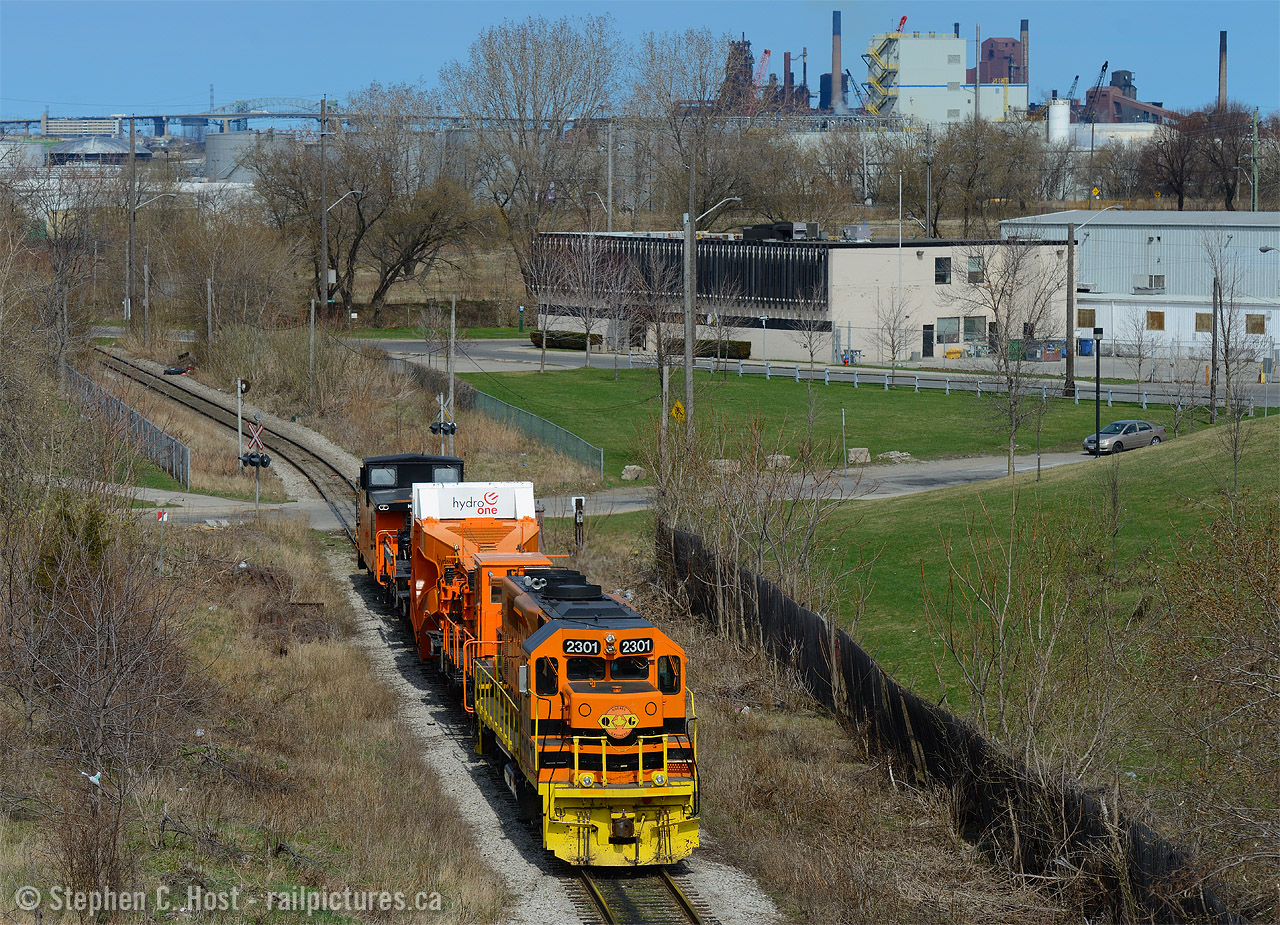 A locomotive to match Hydro One's Schabel, HEPX 200, heading to Federal Marine Terminals dock at Hamilton to load a 296,000 KG transformer, D9R in railway speak. A ship called "Pantanal" loaded the transformer at Yokohama, Japan, sailing to Hamilton arriving on April 20. The transformer was unloaded on the 20th and sat at dock awaiting clearance and a plan from SOR and CN to move it to Pickering for the the final 100 miles. Cam Applegath recently uploaded a photo from the Pickering spur of CN L350 on the final leg of the journey.here