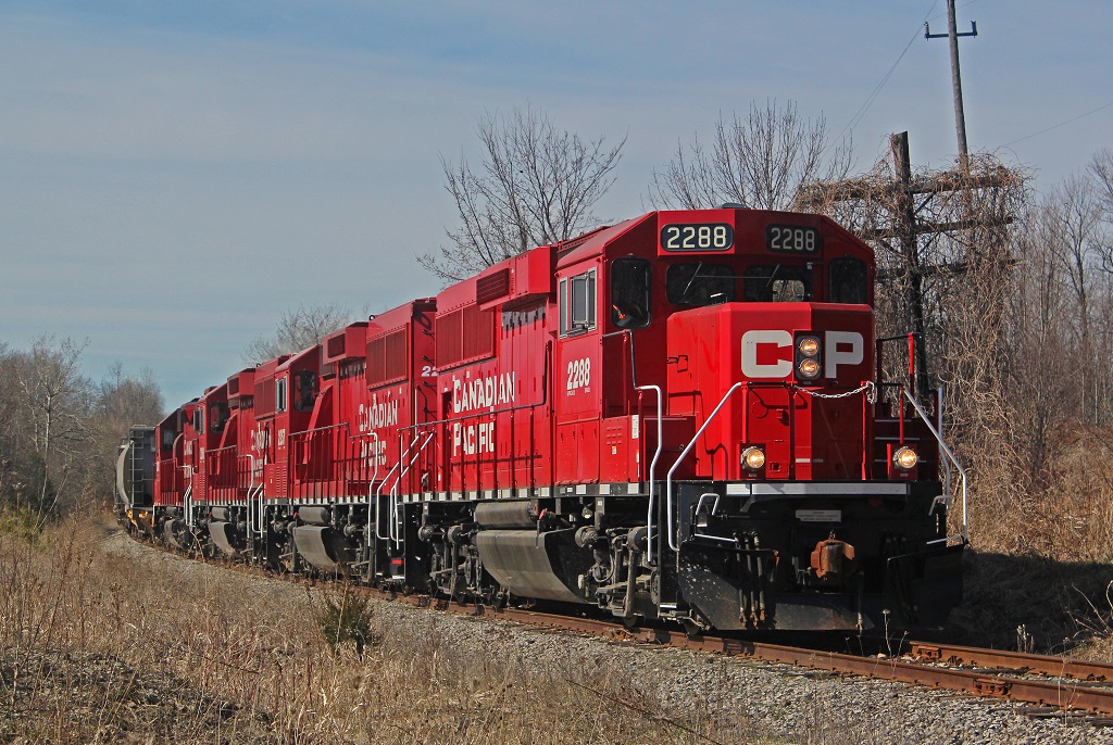 Trundling along at 10 miles per hour, the eastbound KLR job heads through Markham with a 55 car freight train in tow.