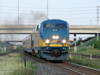 VIA 87 is on-time and on-track: P42DC 912 is giving 'er through Bramalea GO station with 5 LRC coaches in tow, doing track speed past the platforms on the south track. In a few minutes, it will be stopped in downtown Brampton to pick up and drop off passengers, its first stop since leaving downtown Toronto. Being a GO-less Saturday, it only has the usual CN freights to contend with enroute to the Guelph Sub.