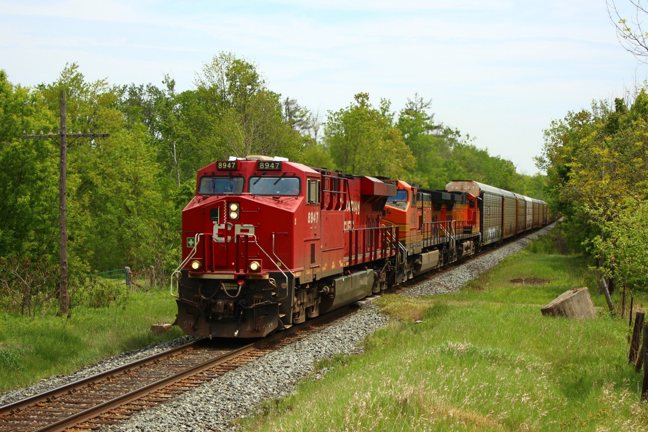CP 147 makes its daily trip in to Puslinch with CP 8947 leading BNSF 4826 and BNSF 4670 with its usual load of Auto Racks. Good to see something other than the usual faded CP's on 147 again.
