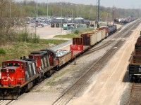 CN 551 departing Aldershot for Hamilton with CN 1444 - CN 4115 and 12 cars
