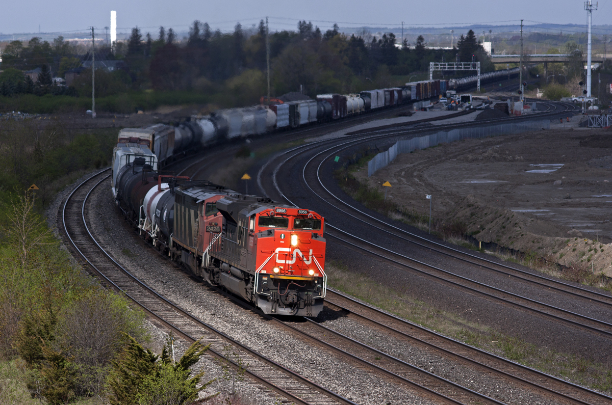 CN 376 rounds the curve at Whitby as it escapes some rolling cloud cover.