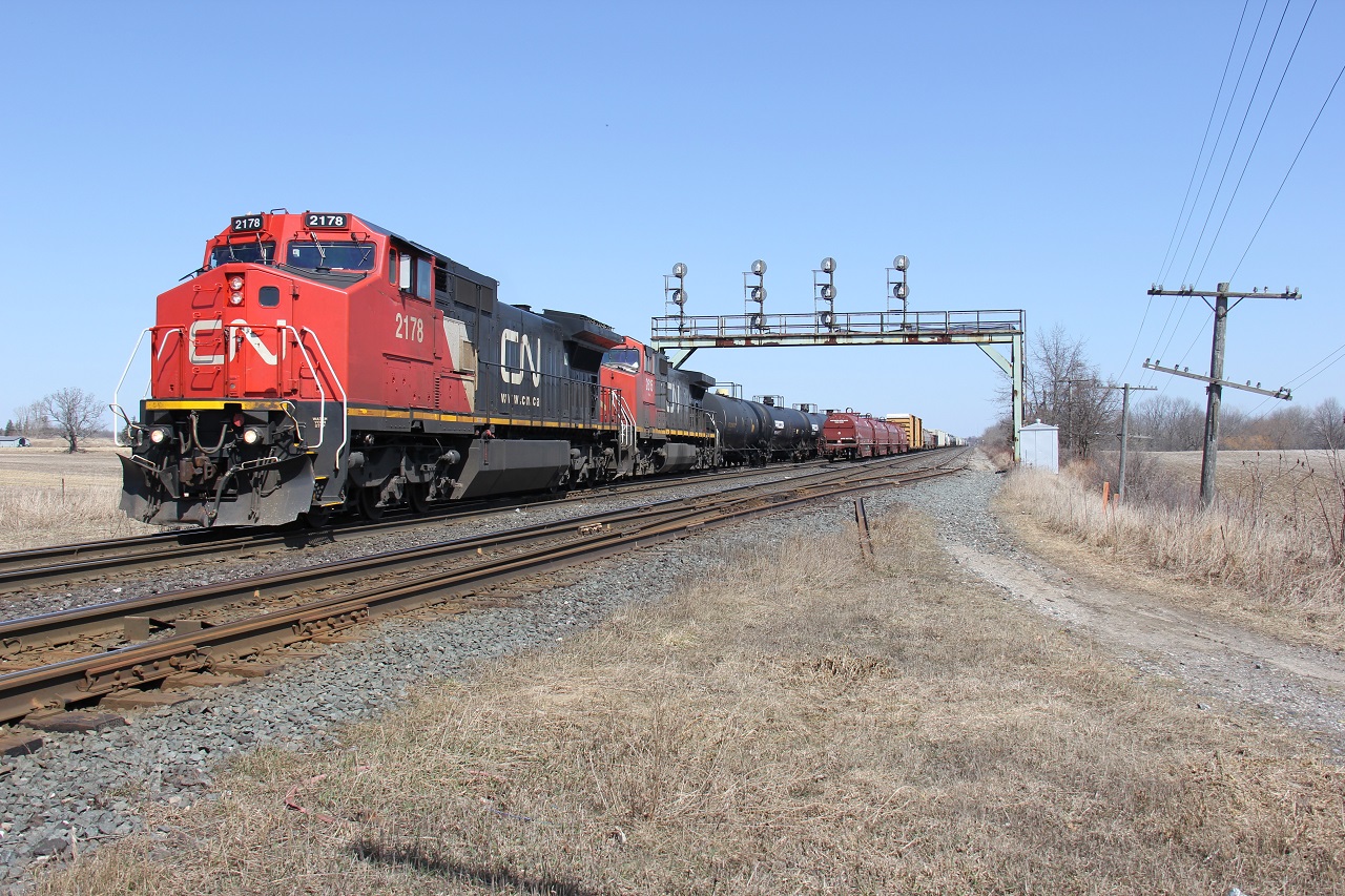 CN 2178 and CN 2615 ease forward with a cut of cars to make up CN 331 on the first nice, sunny and warm day of the year (at least it felt warm after a long, cold winter).