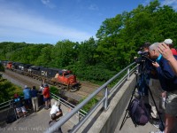 <b>The 20th (Or 21st - debatable right now) Annual C-N-R/C-P-R Bayview meet is on Saturday June 20th 2015. All are welcome - we had a record turnout last year - this year could be even better. Come meet many of those who contribute to Railpictures.ca plus many others. For those who are new - there are washrooms on-site, food is only a couple KM in either direction and parking is free. A very safe place to watch trains. If you are bringing family, such as a spouse, or your parents, they may enjoy the adjacent RBG Laking/Spring Gardens (Admission is required if you wish to enter the RBG, otherwise standing on the bridge is free).<br><br>Event begins at dawn, and continues to supper time, where a group often heads to a local restaurant for food. The hardiest of railfans used to do  24 hours but it's been a few years since these young men have been up to the challenge :)<br><br>
People come from far and wide - if you do come, make SURE you sign the guestbook, or else we don't have you counted for the recordbooks.<br><br>
Pictured above is an eastbound passing the gaggle of cameras from the 2014 meetup. See many of you there.


