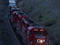 Running about 10 minutes behind CP 118 and preparing to take the siding at Whitby for a meet, CP 2276, 2256, and 8704 lead 132's train through part of the S-curve at MP 183. Yes, they're using GO20ECO's on the eXpressway, second time I've seen this pair on it in the span of a week. 2019hrs.