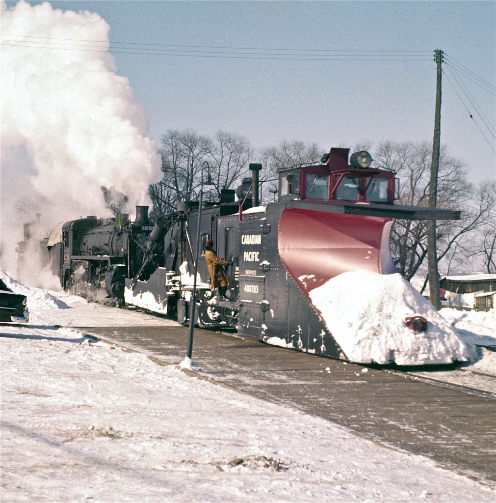 Over the years, I’ve spent many hours studying the late Del Rosamond’s images.  I find them fascinating.

  
This photograph was taken at the Pembroke station – one of Del’s favorite locations.  It was just a few blocks from the fire station where he served for 30 years.   When things were slow at work, I’m wondering if perhaps he would slip over to the tracks just to make sure that nothing was burning.


Special thanks to Del’s family for allowing his photography to be shared and enjoyed here on RPca.