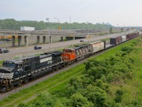 CN 529 approaches Turcot West in Montreal with a short train. Power is provided by Dash9-40CW NS 9017 and SD40-2W CN 5348.