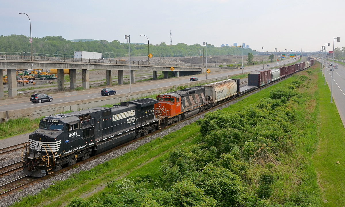 CN 529 approaches Turcot West in Montreal with a short train. Power is provided by Dash9-40CW NS 9017 and SD40-2W CN 5348.