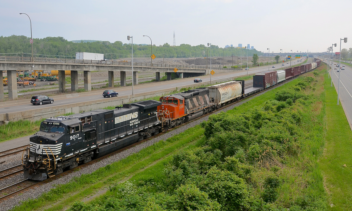 CN 529 approaches Turcot West in Montreal with a short train. Power is provided by Dash9-40CW NS 9017 and SD40-2W CN 5348.
