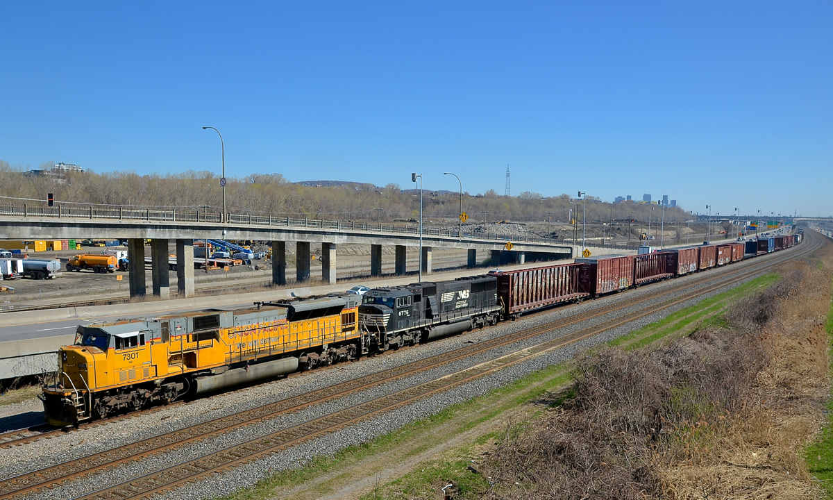 CN 529 has an all-Emd lashup including an ex-UP SD90 and an ex-CR SD60M as it heads west (NS 7301 & NS 6776).