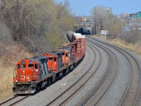 CN 527 (a transfer in the Montreal area) with ran with 3-5 geeps for a number of years, but has primarily run with six-axle power for about a year now. So it was a nice surprise to shoot CN 527 this past Sunday with three geeps in Montreal West (CN 4140, CN 7224 & CN 4729).