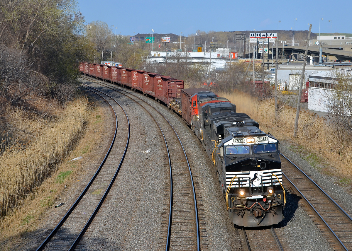 CN 529 has a pair of NS units and a CN unit (NS 7612, NS 8460 & CN 2037) as it heads west through Montreal West.