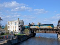 VIA 6412 & VIA 6442 shove the deadheading VIA 14 past Wellington tower on a sunny evening. At the other end was Park Car Evangeline Park.