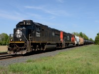 Train 331 west bound at Stewardson Sideroad lead by IC 1031 followed by CN 5774.