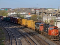 CN 5648 & CN 2406 lead CN 309 which is slowly picking up speed after a crew change at Turcot West.