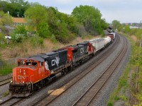 CN 323 has CN 9418 leading on its return to Montreal from St. Albans, Vermont , with CN 2037 trailing. It's become quite rare to see a GP40-2LW leader on a mainline freight so this was a nice treat, with 9418 in the short-lived North American paint scheme.
