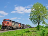 CN 327 is approaching Coteau yard where it will set off some cars and pick up a third unit before heading to Huntingdon where a CSXT crew will take it south towards the U.S. Power is CN 2428 & CN 5643.