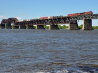 CP 253 has a short train powered by three CP GE's (CP 8515, CP 9604 & CP 8920) as he crosses the St-Lawrence river, his journey to St-Luc Yard in Montreal almost done.